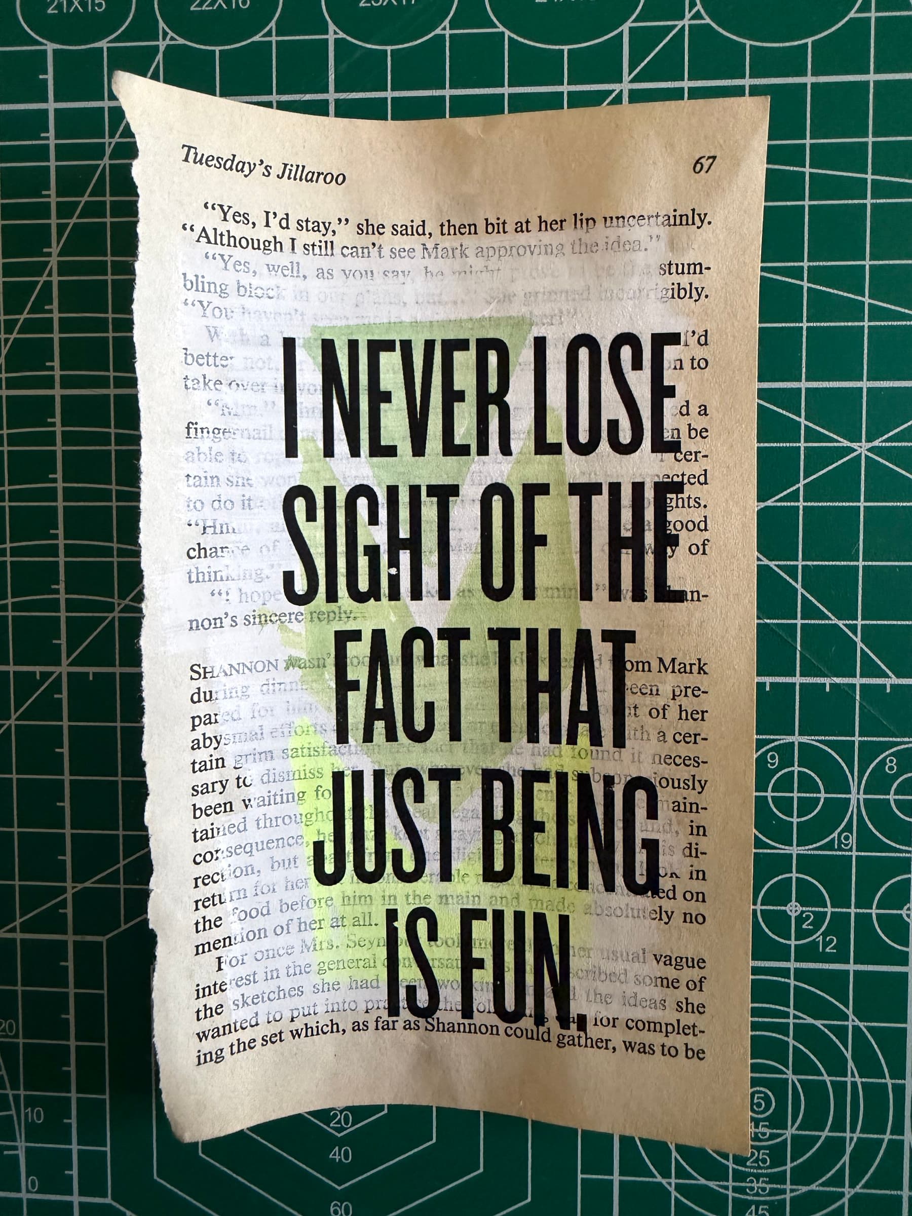 NEVER LOSE SIGHT OF THE FACT THAT JUST BEING IS FUN: black display caps overprinted on a soft yellow-green watercolor block