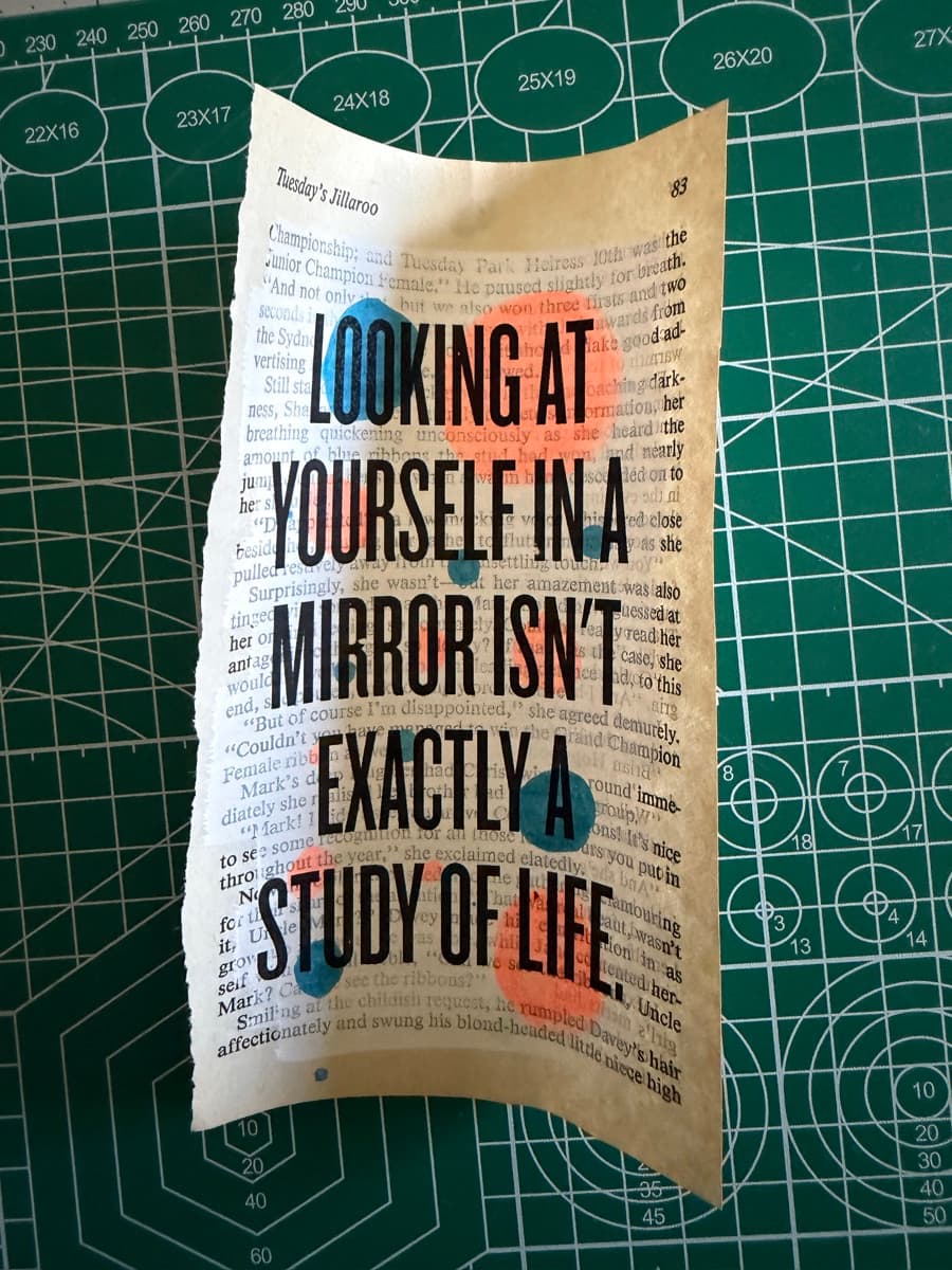 LOOKING AT YOURSELF IN A MIRROR ISN'T EXACTLY A STUDY OF LIFE : over orange and teal painted blocks