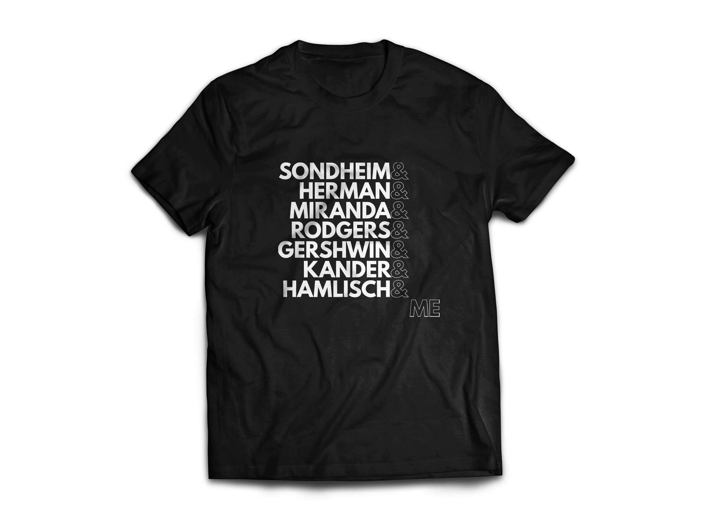 A black t-shirt printed with seven composer surnames stacked in white display caps separated by ampersands — SONDHEIM & HERMAN & MIRANDA & RODGERS & GERSHWIN & KANDER & HAMLISCH & — and ending with ME set in outline caps so the wearer becomes the next name in the line.