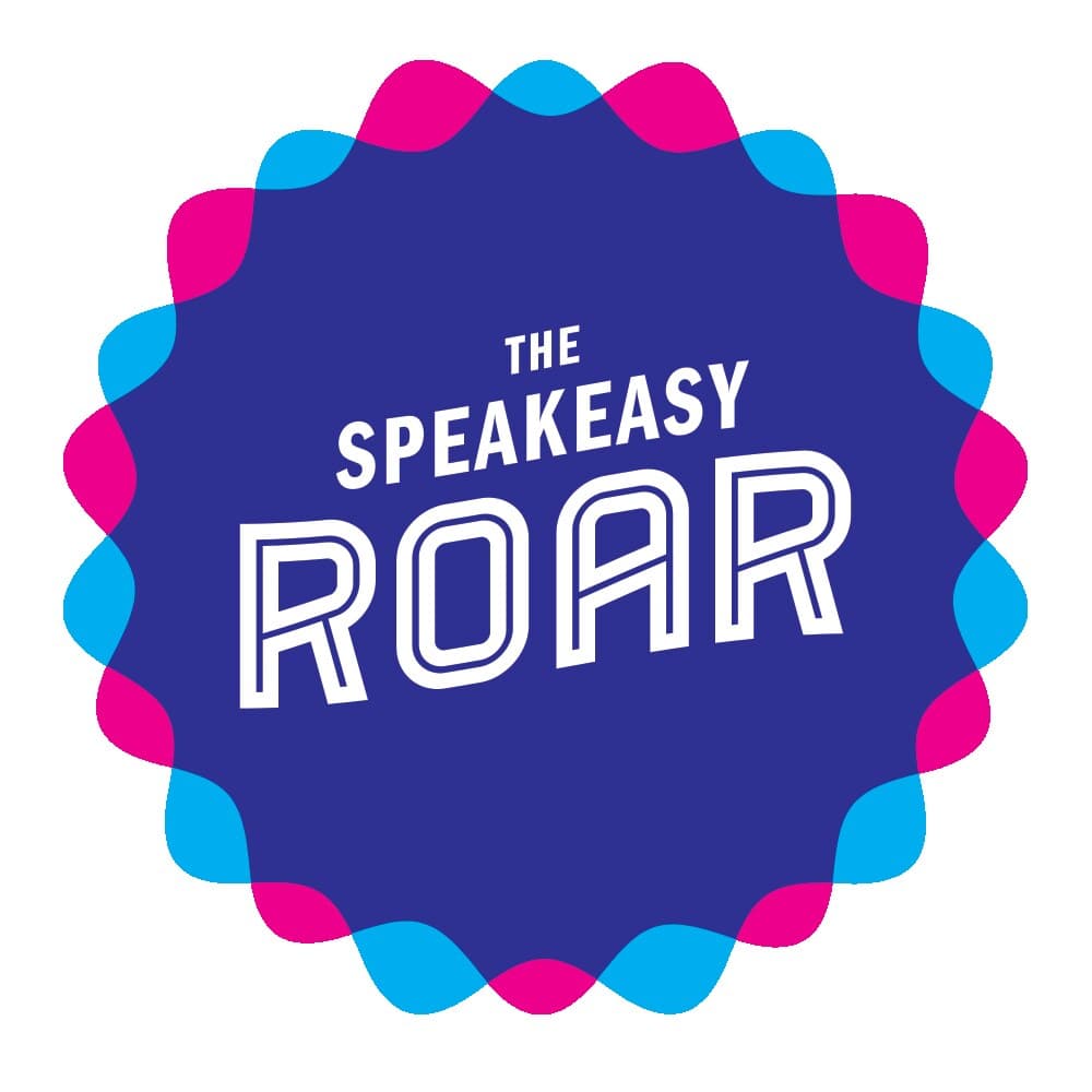 The Speakeasy Roar mark: a deep navy circular rosette with pink and cyan scalloped ribbons radiating around the perimeter, THE SPEAKEASY in white tracked caps stacked above ROAR set in chunky outlined display caps inside the rosette.