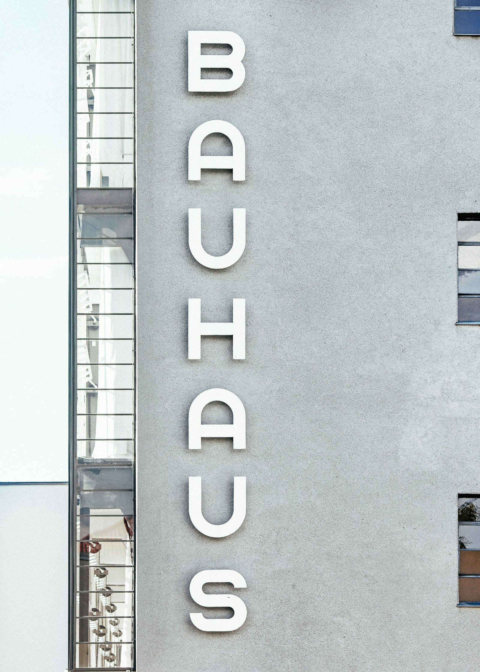 Bauhaus Dessau building exterior: vertical BAUHAUS lettering running down a concrete wall